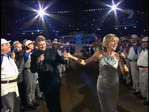 Olivia Newton-John and John Farnham perform at the Sydney Olympics