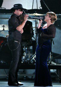 Jason Aldean and Kelly Clarkson perform their hit duet: "Don't You Wanna Stay" at the 2010 CMA Awards. (Photo property of the Country Music Association)