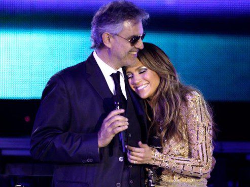 Andrea Bocelli and Jennifer Lopez embrace after the duo performed their duet: "Quizas Quizas Quizas." (Photo property of the Associated Press)