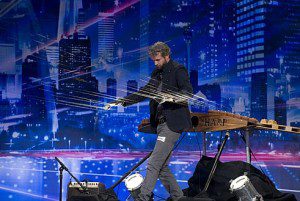 Earth harpist William Close debuted his huge string instrument during the Season Seven auditions. (Photo property of NBC and SYCO-TV)