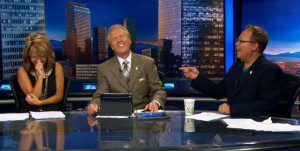Kirk shares a laugh with his 9 News colleagues: Mark Koebrich and Kim Christiansen at the 9 News anchor desk. (Photo courtesy of Kirk Montgomery) 