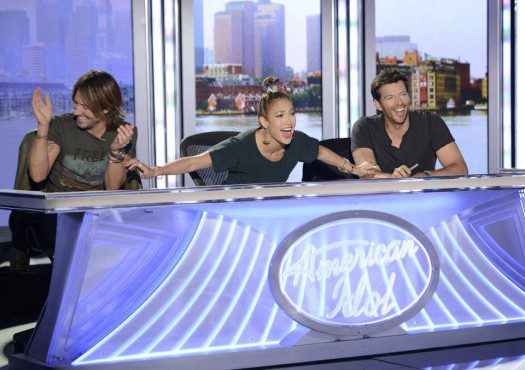 Keith Urban, Jennifer Lopez and Harry Connick, Jr. share a laugh while filming "American Idol." (Photo property of 19 Entertainment, FremantleMedia North America & FOX)
