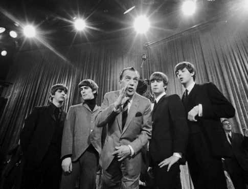 The Beatles pose with Ed Sullivan after an appearance on his show. (Photo property of the Associated Press)