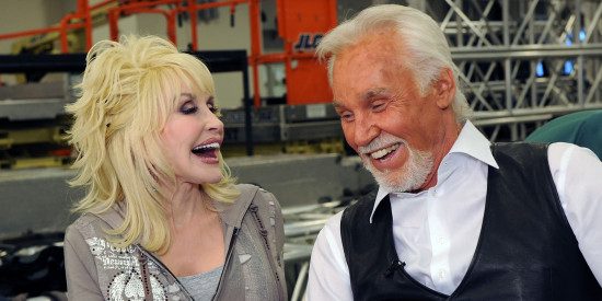 Dolly shares a laugh with Kenny Rogers on backstage at the Grand at Foxwoods in 2010. (Photo property of "The Huffington Post"