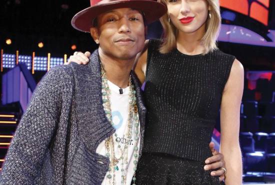 Pharrell poses with Taylor Swift The Voice