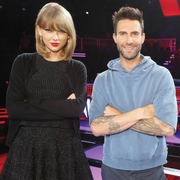 Adam Levine has a pose down with key advisor Taylor Swift during a taping of "The Voice: Season Seven" Knockout Rounds. (Photo property of NBC)