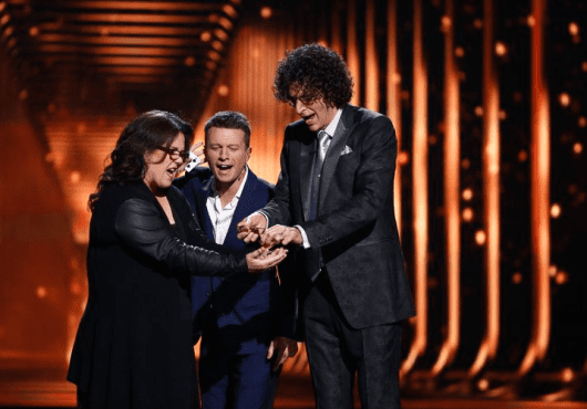 Rosie O'Donnell performs with Mat Franco and Howard Stern