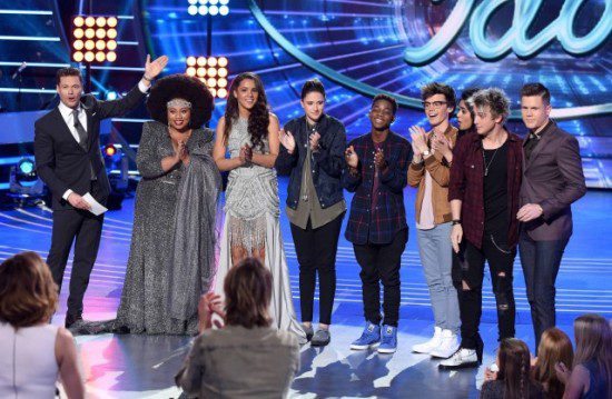 The "American Idol: Top Eight" pose with Ryan Seacrest during an "American Idol" taping. (Photo property of FOX, FremantleMedia North America & 19 Entertainment)