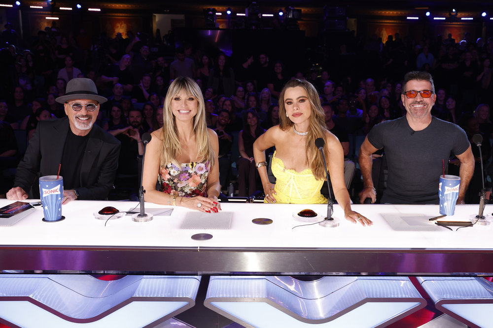 Howie, Heidi, Sofia, and Simon pose together during a live taping of AGT: Season 18! (Photo property of NBC's Trae Patton)
