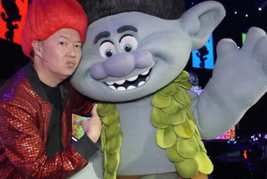 Ken Jeong posed with Branch the Troll when The Masked Singer: Season 10 celebrated Trolls Night! (Photo property of FOX)